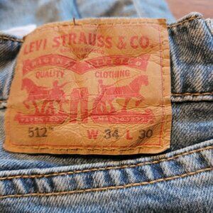 Levi's Men's faded with fashionable rips jeans size 34/30